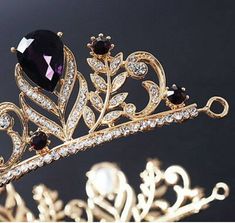 Handmade Bridal Tiaras/Crown Diamond Weight -- 14.10ct Diamond shape -- Round Diamond Cut -- Rose Cut Diamond Color -- Tinted Brown Colour Stone Wt. -- 19.20ct Colour Stone-- Blue Sapphire / Garnet / Green Emerald/ Purple (Lab Created) Metal -- Sterling Silver Silver Purity --92.5% Silver Wt. -- 58.600gm Tiaras Length -- 18inch) Tiaras Finishing Antique/gold Tiaras/Crown All The Diamonds Are Real & Natural This item takes minimum 10 to 14 Days to ship after receiving the payment. Payment WE Elegant Tall Gold Crown, Elegant Gold Crown With Pinched Shape, Elegant Formal Jewelry With Tall Crown, Elegant Tall Crown For Party, Regal Tall Crown For Formal Occasions, Formal Tall Regal Crown, Elegant Rhinestone Crown Jewelry, Elegant Jewelry With Rhinestones, Regal Teardrop Crown Jewelry For Party