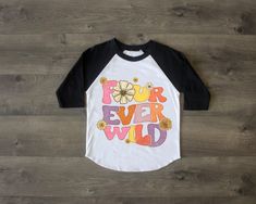 Celebrate your little one's 4th birthday with our "Four Ever Wild" shirt. It's vibrant, comfortable, and perfect for a wild adventure!. Order yours today from California T House! When you order ours shirt, you can be sure that you're getting a high-quality, handmade item that is sure to make your little girl feel special on her big day. Our decals are printed directly to garments. We use a printing method that accurately reproduces intricate details and graphics with such a wide range of colors. Four Birthday Shirt, Four Ever Wild Birthday, Four Ever Wild, Fourth Birthday, Wild Adventures, Feel Special, Feeling Special, Birthday Shirt, 4th Birthday