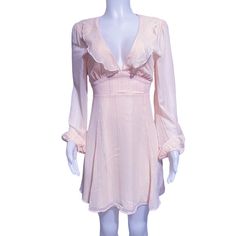 Lush Pink Blush Flowy Mini Dress Color: Blush With Silver Metallic Size: Large Nwt Gorgeous Flowy Blush Pink Mini Dress Silver Metallic Pin Stripes Throughout Light Ruffle Neckline Tie Back Top Closure Open Back Zip Closure Bishop Sleeve Please Note! Item(S) Will Be Tested/Checked Again Prior To Shipment And Be Video Recorded For Insurance Of Both The Seller And Buyer. Disclaimer: Product Color And Quality As Seen On A Monitor May Vary Slightly Compared To Actual Items Due To Photography Lightin Feminine Flowy Lined Mini Dress, Feminine Chiffon Mini Dress, Feminine Chiffon Mini Dress For Daywear, Feminine Flowy Mini Dress For Daywear, Feminine Lined Mini Dress For Daywear, Flowy Feminine Mini Dress, Feminine Flowy Mini Dress For Night Out, Chic Peach Mini Dress With Ruffles, Feminine Flowy Dress For Night Out