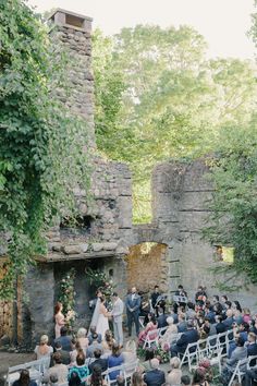 a wedding ceremony in an old stone building