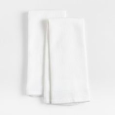 two white towels folded on top of each other