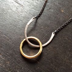 This simple necklace resembles a horse shoe and serves as a ring holder. I had a request from a massage therapist, she wanted a necklace that she could hang her wedding ring from so she could have her hands free. Hammered sterling is united by oxidized sterling chain. Great on it's own or with long layers. (RING IN 2ND PHOTO NOT INCLUDED) 1" wide, 16" sterling chain Wedding Ring Necklace Holder Men, Wedding Ring Necklace Holder, Ring Holder Necklace, Silver Jewlery, Burlington Vt, Ring Holder Wedding, Wedding Ring Necklaces, Necklace Holder, Jewelry Wedding Rings