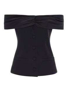 Introducing our Black Nadine Suit top. The off shoulder design and suiting details make it a perfect statement piece. Crafted from soft, premium fabrics, it's a timeless wardrobe staple that will instantly upgrade any outfit. Wear this to grab drinks with friends or to your next dinner party. PRODUCT DETAILS + CARE 100% Polyester Dry Clean Only SIZE + FIT XS: Bust 33" Length 16" S: Bust 34" Length 16" M: Bust 35" Length 17" L: Bust 38" Length 18" Runs true to size Keilah is 5'9 & wears an XS Elegant Off-shoulder Top For Date Night In Spring, Chic Fitted Off-shoulder Top, Chic Tailored Tops For Evening, Chic Tailored Tops For Night Out, Elegant Fitted Off-shoulder Top For Date Night, Chic Fitted Off-shoulder Top For Formal Occasions, Chic Fitted Off-shoulder Top For Party, Classic Tailored Tops For Evening, Classic Tailored Top For Party