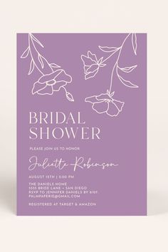 the bridal shower is shown in purple and white, with flowers on it's side