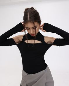 Model (Wearing S):• Height: 171cm | Bust: 83cm | Waist: 59cm | Hips: 89cmDetails: Long-sleeve bodysuit with shoulder and chest cut-out detailsLength: NormalSleeve Length: Long sleevesMaterials: 95% Polyester + 5% Spandex Stretch Cutout Long Sleeve Bodysuit, Stretch Long Sleeve Cutout Bodysuit, Cutout Long Sleeve Stretch Bodysuit, Edgy Long Sleeve Bodysuit For Night Out, Fitted Long Sleeve Top With Cutout, Long Sleeve Cutout Bodysuit For Night Out, Black Long Sleeve Tops With Cutout, Black Long Sleeve Cutout Top, Trendy Cutout Tops For Fall