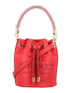 Grain Leather The Bucket Bag By Marc Jacobs. Featuring: Full Grain Leather Drawstring Pull Closure Rope Top Handle Removable And Adjustable Leather Strap Embossed Logo At Front One Interior Slip Pocket Contrast Color Leather Interior Height: 21cm Width: 18cm Depth: 18cm Composition: 100% cow leather | Marc Jacobs Women's The Bucket Bag in True Red | SS24 Leather Bucket Bag, Leather Bucket, True Red, Embossed Logo, Luxury Retail, Leather Interior, Bridal Shoes, Full Grain Leather, Luxury Boutique