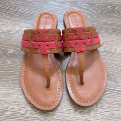 Tory Burch Sandals In Size 7, Only Worn Twice. Has Pink Logo On Top. Comes With Original Box Pink Flat Leather Sandals, Pink Leather Sandals With Cushioned Footbed, Pink Leather Sandals With Flat Heel, Pink Leather Flat Heel Sandals, Pink T-strap Casual Sandals, Tan T-strap Sandals For Spring, Casual Pink T-strap Sandals, Adjustable Pink Leather Sandals, Pink Adjustable T-strap Sandals