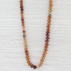 "This lovely new necklace is an authentic Nina Nguyen piece. This necklace has a retail price of $495. Gem: Multi-Colored Gold Hessonite Garnet Beads Metal: Sterling Silver Weight: 80.1 Grams Stamps: Nina Nguyen 925 N Style: Bead Strand Closure: Lobster Clasp Length: 39 1/2 - 43 1/2\" Width: 7.8 mm Approximate Each piece is thoroughly examined and refinished as needed by our professional jewelers, graded by our in-house GIA (Gemological Institute of America) Graduate Gemologist, and inspected fo Heirloom Necklace, Cotton Candy Colors, Pink Tourmaline Ring, Hessonite Garnet, Drop Pendant Necklace, Halo Pendant, Recycled Jewelry, Peridot Ring, Message Jewelry