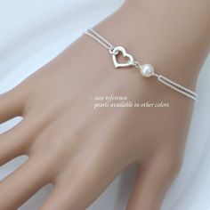 Sterling Silver Heart and Swarovski Pearl by alexandreasjewels White Pearl Bracelet With Heart Charm For Wedding, White Pearl Wedding Bracelet With Heart Charm, White Heart-shaped Pearl Bracelet For Wedding, Heart Charm Bracelet For Wedding And Mother's Day, Heart Charm Bracelets For Wedding And Mother's Day, Sterling Silver Heart Bracelet For Wedding And Mother's Day, Heart Bracelet For Wedding And Valentine's Day, Elegant Pearl Bracelet With Heart Beads For Wedding, Valentine's Day Wedding Heart Bracelet