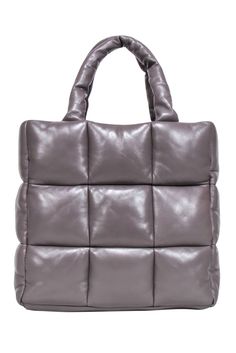 The "Assante" Puffy Tote from Stand Studio is the perfect way to add a touch of fun to your wardrobe. This trendy tote features gorgeous quilted leather in a subtle taupe hue, making it the perfect neutral to match any outfit. Show off your style with this must-have puffy bag! 100% Lamb Leather Lining 100% Polyester No top closure Dust bag included Double top handle Detachable crossbody strap Internal zipper pocket Width 15" Height 13" Depth 6" Strap drop 7" Brown Quilted Leather Bag, Quilted Leather Square Bag, Trendy Quilted Brown Bag, Chic Brown Quilted Shoulder Bag, Quilted Square Leather Bag, Square Quilted Leather Bag, Trendy Quilted Bags For Fall, Trendy Quilted Leather Bag, Puffy Bag