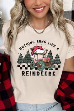 Add a touch of whimsy to your holiday wardrobe with this 'Nothing Runs Like a Reindeer' Christmas unisex graphic tee. This playful tee features a fun and festive design that combines the rugged charm of a tractor with the magic of Santa's reindeer. Crafted from high-quality materials, this tee is comfy and perfect for any day. The unisex fit ensures it's suitable for everyone, and the unique graphic is sure to be a hit at any festive occasion. Made with pride in Nicaragua, this piece offers both Concealed Carry Handbags, Santa's Reindeer, Closet Candy Boutique, Plus Swimwear, Christmas Funny, Festive Design, Reindeer Christmas, Holiday Wardrobe, Teacher Outfits