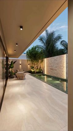 an outdoor living area with white tile flooring