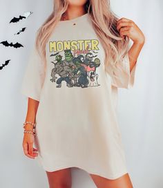 Monster Mash Unisex Tshirt for Halloween. Comfort Colors introduces its garment-dyed t-shirt; a fully customizable tee made 100% with ring-spun cotton. The soft-washed, garment-dyed fabric brings extra coziness to your wardrobe while the relaxed fit makes it an excellent daily choice. The double-needle stitching throughout the tee makes it highly durable while the lack of side-seams helps the shirt retain its tubular shape. .: 100% ring-spun cotton .: Medium fabric (6.1 oz/yd² (206.8 g/m .: Relaxed fit .: Sewn-in twill label Horror Style Short Sleeve T-shirt For Fall, Cotton Horror Short Sleeve Top, Halloween Band Merch Crew Neck T-shirt, Halloween Band Merch T-shirt With Crew Neck, Spooky Short Sleeve T-shirt For Fan Merchandise, Horror T-shirt With Sublimation Print For Halloween, Halloween Horror T-shirt With Sublimation Print, Horror Cotton T-shirt With Letter Print, Horror Halloween T-shirt With Sublimation Print