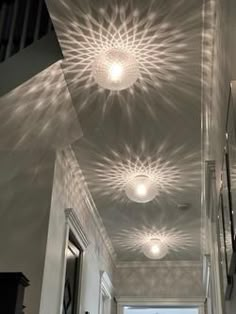 a hallway with some lights on the ceiling