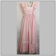 *Cute, Feminine, Pink Gingham *Long Vintage Dress 1970s *Sleeveless With Ruffles Over Shoulders *Lace Accents *Lace Covered Buttons On Bodice *Back Zipper *Ties In Back *Gently Worn, Very Good Condition *Ruffled Hem *Chest 34 In. Waist 28 In. Length 58 In. Shoulder To Hem Long Vintage Dress, Pink Gingham, Pink Maxi Dress, Dress Pink, Vintage Dress, Covered Buttons, Gingham, Vintage Dresses, Pink White