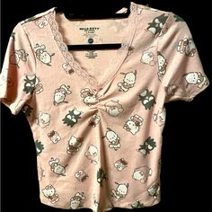 Hello Kitty And Friends Blouse. Size M. Nwt. Cute Hello Kitty Print Tops For Spring, Cute V-neck Top With Graphic Print, Kawaii Cat Print Tops For Spring, Spring Kawaii Cat Print Tops, Casual Hello Kitty Print Stretch Tops, Kawaii Fitted Tops For Spring, Casual Stretch Tops With Hello Kitty Print, Fitted Kawaii Tops For Spring, Fitted Short Sleeve Tops With Hello Kitty Print