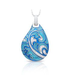 The Fernhaven Pendant features the finest hand-painted, translucent Italian enamel. Set in platinum-plated sterling silver, with accent stones, this sumptuous set releases your wild side! A unique and majestic piece, the Fernhaven Pendant is designed for those who dare to be different. Show off your style with this remarkable blend of captivating colors and fine materials. Materials: Hand-painted translucent Italian enamel with white stones set into platinum-plated, nickel allergy-free, 925 ster Elegant Teardrop Enamel Jewelry, Luxury Enamel Inlaid Jewelry, Elegant Turquoise Inlay Necklace, Elegant Turquoise Necklace With Inlay, Luxury Silver Jewelry For Art Collection, Artistic Enamel Jewelry For Formal Occasions, Luxury Blue Teardrop Pendant Jewelry, Luxury Silver Jewelry With Inlay, Elegant Enamel Jewelry With Large Pendant