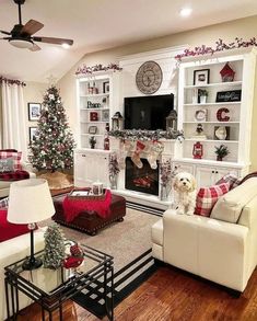 a living room filled with furniture and a christmas tree