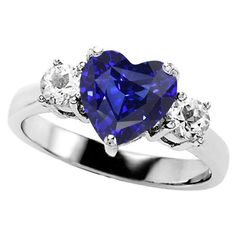 Fine Jewelry Sapphire Heart Cut Ring, Heart Cut Sapphire Ring In Fine Jewelry Style, Heart Cut Sapphire Ring Fine Jewelry, Blue Heart Cut Sapphire Ring For Formal Occasions, Blue Heart Cut Sapphire Ring For Formal Events, Blue Heart Cut Sapphire Ring, Blue Sapphire Heart Cut Ring, Blue Heart Cut Sapphire Gemstone Ring, Elegant Blue Heart Cut Sapphire Ring