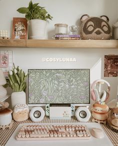 a desk with a keyboard, mouse and other items on it