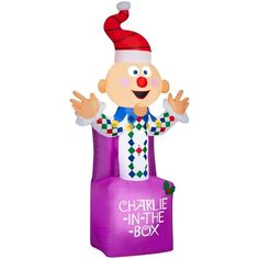 a large inflatable balloon with a clown on it's head and the words charlie in the box