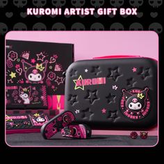 a black and pink box with hello kitty stickers on it