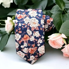 Treat yourself with a new pattern and splash of color to your look with this unique tie. 100% Cotton Handmade Package Includes: Slim Tie Length: 57" Width: 2.6" Warm iron if needed Blue Tie For Summer As A Gift, Blue Tie For Summer Gift, Blue Ties For Summer Gift, Blue Ties As Summer Gift, Fitted Neckwear For Summer Gifts, Adjustable Blue Floral Print Tie, Blue Floral Print Suit And Tie Accessories For Spring, Spring Blue Floral Print Suit And Tie Accessories, Blue Floral Print Tie As Gift