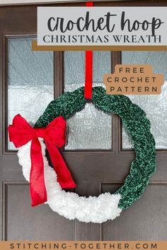 a christmas wreath hanging on the front door with a sign that says crochet hoop