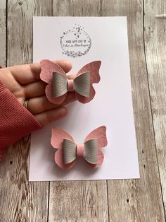 A beautiful butterfly bow made with baby pink and silver faux leather. I design and create all of the products I offer, so you can be sure you have something unique and special.Each bow is made by hand from high quality fabric locally sourced. Lots more other butterfly colour options and many more bows available on my store page, check them out! This bow is also available as a pair. The hair bow are available in  Standard 2.5 inches ( 6cm) approx. Large 3 inches Pair - 2 x 2.5 - if you order the pair with crocodile clips I will add a left and a right. Let me know if you would prefer both on the same side in either a note at checkout or send me a message :) The bows come with either a stainless steel alligator clip or a hair bobble.  ADDITIONAL INFORMATION All hair bows are made by hand. Pa Butterfly Colour, Faux Leather Hair Bows, Unique Hair Bows, Faux Leather Bows, Leather Butterfly, Ribbon Crafts Diy, Butterfly Bow, Hair Bobbles, Pink And Silver