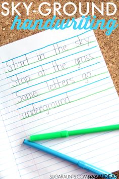 a paper with writing on it next to a green pencil and blue marker, which says sky - ground handwriting