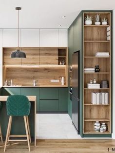 the kitchen is clean and ready to be used as a dining room or office area