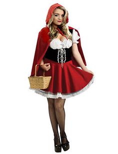 a woman dressed in a red riding habit and holding a wicker basket is posing for the camera