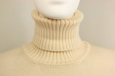 1996 Gucci by Tom Ford White Wool Turtleneck Top For Sale at 1stDibs Beige Gucci Long Sleeve Sweater, Gucci Beige Long Sleeve Sweater, White Gucci Tops For Winter, Casual Fitted Gucci Sweater, Elegant White Gucci Top, Elegant White High Neck Turtleneck, Cream Fitted Turtleneck For Winter, Fitted Cream Turtleneck For Winter, Elegant White Funnel Neck Turtleneck