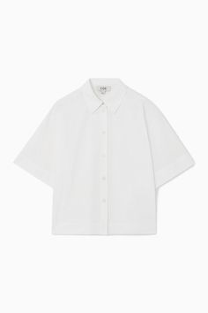 Swap out your long-sleeved shirts for this summery version as the weather warms. It's crafted from pure cotton-poplin that has a naturally breathable quality and designed in a slightly boxy shape that'll work just as well tucked in as it will left loose over skirts and pants.- Regular fit- Button closure- Short sleeves100% Cotton / Machine washBack length of size  6 is 22.04" / Model wears a size 6 Modern Tops, Women Magazines, Poplin Shirt, Cotton Poplin, Sleeve Cotton, Cotton Shorts, Cotton Shirt, Pure Cotton, Button Up Shirts