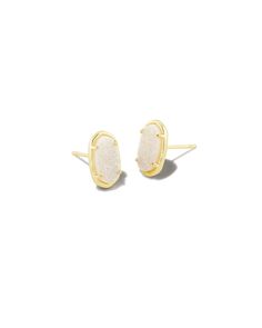 A polished pair of studs in our signature shape. The Grayson Stud Earrings are sophisticated and unique, featuring our iconic silhouette inlaid with a genuine Iridescent Drusy stone. Kendra Scott Earrings Studs, Opalite Crystal, Kendra Scott Earrings, Rose Quartz Stone, Gold Stud Earrings, Stone Studs, Gold Stud, Gold Pendant Necklace, Quartz Stone