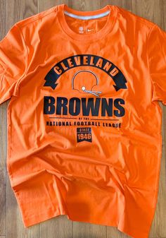 Nike Cleveland Browns Orange Historic Tri-Blend Short Sleeve Fashion T Shirt - 17321576 Sports Fan T-shirt With Screen Print And Crew Neck, Retro Sports T-shirt With Graphic Print, Sporty Crew Neck T-shirt With Letter Print, Orange Short Sleeve T-shirt For Game Day, Crew Neck T-shirt For Sports Season, Casual Crew Neck T-shirt For Football Season, Graphic Print Crew Neck Top For Fans, Crew T-shirt For Sports Events, Orange Cotton T-shirt For Game Day