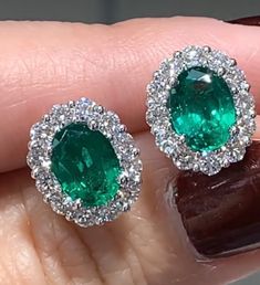 Emerald Earrings is a great way to create a classic, heirloom look you will feel Elegant, princess like immediately. The center stone is Oval in shape and has gorgeous facets. For extra sparkle, it has been framed by 10 round diamonds forming a beautiful halo around. Metal: 18K White goldDiamond Weight: 1.04ctwEmerald Weight: 2.16ctw Dimensions: L: 13mm X W: 13mm Emerald And Diamond Earrings, Biedermeier Furniture, Golden Rings, 3 Earrings, Golden Ring, All Gems, Deco Floral, Dream Nails, Emerald Earrings