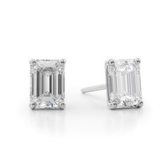 Elevate all your favorite looks with ease when you add these luxe emerald-cut diamond solitaire stud earrings in white gold. Created in 14K white gold Each earring showcases a 1/2 ct. emerald-cut diamond solitaire. Dazzling with 1 ct. t.w. of diamonds These post earrings secure comfortably with friction backs. Classic White Gold Baguette-cut Earrings, Elegant Emerald Cut Platinum Diamond Earrings, Elegant Platinum Emerald Cut Diamond Earrings, Timeless Emerald Cut Diamond White Earrings, Classic Diamond Earrings With Baguette Diamonds, Timeless White Gold Baguette Cut Diamond Earrings, Classic Baguette Diamond Earrings For Everyday Luxury, Emerald Cut White Lab Grown Diamond Earrings, White Emerald Cut Lab Grown Diamond Earrings