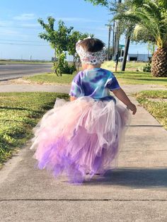 This high low tutu is next level. Over 100 yards of tulle, short in the front, long in the back with tiered layers creating a wild look. Sizing Info: 1-3T is roughly 6 inches long in the front 3-5T is roughly 8 inches long in the front Add your color choices in the notes at check out. Playful Ruffled Tutu Dress, Playful Ruffled Tutu Dress In Tulle, Playful Ruffled Tulle Tutu Dress, Summer Tiered Tutu Dress With Tulle Skirt, Tiered Tulle Tutu Dress For Dress-up, Summer Tiered Tulle Tutu Dress, Princess Style Tiered Tulle Tutu Dress, Whimsical Tulle Skirt Tutu Dress For Dress-up, Whimsical Summer Tutu Dress With Tulle Skirt