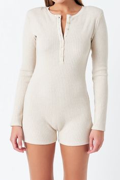 Our Ribbed Knit Romper is a stylish way to jump into spring with a timeless look. This romper features ribbed knit material a button down detail and a long sleeve look. It's perfect for any occasion and will make sure you look chic while staying comfortable. With its eye-catching design and unique button down detail this romper is perfect for anyone looking to stay stylish while showing off their own unique style. Shop our Ribbed Knit Romper today and make a fashion statement! Ribbed knit Romper Jumpsuit Fall, Dress Night Out, Knit Romper, Streetwear Essentials, Knitted Romper, Leather Denim, Tweed Dress, Blazer And Shorts, Geek Chic