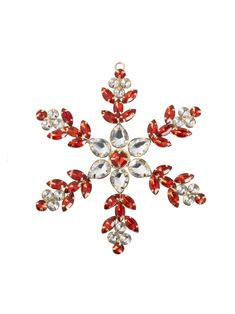 a red and white snowflake on a white background