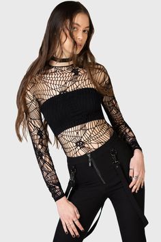 WEBS GRASP.- Soft, stretch fishnet.- Statement web style net with interwoven skulls.- Long sleeves.- Fitted.With KIHILIST branding, 94% Polyamide, 6% Elastane.Hand wash cold (30°c) / Do not bleach / Do not tumble dry / Iron at low temperature / Do not dry clean. Imported. Gothic Mesh Top With Mesh Sleeves, Black Sheer Mesh Top Gothic Style, Edgy Stretch Mesh Top For Club, Edgy Club Mesh Top, Alternative Stretch Mesh Top, Stretch Black Mesh Top With Hollow Out Details, Black Stretch Mesh Top With Hollow Out Details, Fishnet Mesh Tops For Alternative Fashion, Alternative Fashion Fishnet Mesh Top