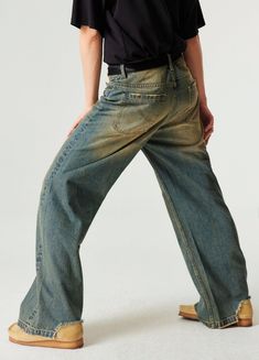 Retro-Inspired Wide Leg Denim Jeans - Embrace a nostalgic look with these wide and baggy fit jeans. Featuring a straight leg design, ripped back hemline, and distressing details, these 100% denim cotton jeans are unisex and perfect for any casual outfit. Available in wash blue, they include a unique SP leather patch on the back. Sizes: Extra Small, Small, Medium, Large, Extra Large SIZE (CM) LENGTH WAIST BUTT EXTRA SMALL 101 69 90 SMALL 104 75 96 MEDIUM 106 79 100 LARGE 108 83 104 EXTRA LARGE 11 Faded Distressed Denim Flare Jeans, Distressed Dark Wash Rigid Denim Flare Jeans, Faded Flare Jeans With Frayed Hem In Rigid Denim, Faded Flare Jeans With Frayed Hem, Faded Distressed Full Length Flare Jeans, Casual Faded Recycled Denim Flare Jeans, Casual Flare Jeans In Faded Recycled Denim, Faded Distressed Straight Leg Jeans, Washed Blue Distressed Wide Leg Flare Jeans