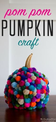 pom pom pumpkin craft with text overlay that reads pom pom pumpkin craft