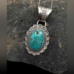 John Nelson Signed Navajo Handmade Sterling Silver Natural Royston Turquoise Pendant Necklace Orders Totaling $100 And Up Include An Anti-Tarnish Treated Velvet Jewelry Pouch! The Sterling Silver Chain Measures Approximately 24" Stamped Sterling And Is Pre-Owned The Pendant Measures Approximately 2 3/8" X 1.25" And Is New Bale Opening Measures Approximately 10mm Total Weight Is Approximately 22 Grams Condition: Chain Pre-Owned, Pendant New Metal: Sterling Silver. See Photos For Hallmark Comes In Traditional Blue Turquoise Necklace In Sterling Silver, Engraved Silver Turquoise Necklace In Southwestern Style, Bohemian Blue Turquoise Necklace Stamped 925, Bohemian Turquoise Necklace Stamped 925, Western Style Engraved Blue Jewelry, Bohemian Oval Turquoise Necklace Stamped 925, Southwestern Style Engraved Turquoise Necklaces, Sterling Silver Turquoise Necklace With Concho, Handmade Southwestern Oval Turquoise Necklace