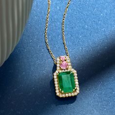 Ross-Simons - 1.50ct Emerald, .20ct t. w. Pink Sapphire Pendant Necklace, .18ct t. w. Diamonds. 20". The lush colors of our dewy pendant necklace will keep you in a spring state of mind all year round. A verdant 1.50 carat emerald is topped with candy-colored .20 ct. t. w. pink sapphires, while .18 ct. t. w. diamonds add all-around sparkle. Crafted in sunny 14kt yellow gold. Suspends from a rope chain. Springring clasp, diamond, pink sapphire and emerald pendant necklace. Emerald birthstones are Fine Jewelry With Emerald-cut Pink Sapphire, Yellow Gold Pink Sapphire Necklace, Emerald Necklace With Diamond Oval Pendant, Fine Jewelry, Pink Sapphire Gemstone Pendant Jewelry, Luxury Pink Sapphire Pendant Jewelry, Emerald Necklace Pendant, Pink Sapphire Pendant, Sapphire Necklace Pendants, Emerald Birthstone