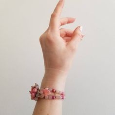 This is a vintage post-WW2 West Germany bracelet. The back of the center cluster is a gold tone metal with the West Germany signature. The front of the bracelet is a variety of pink tone beading. The beads even include a leaf shape for texture and variety. The band of the bracelet is a wrap/coil style and is made of the same pink tone beads in the center cluster. The bracelet is in great condition.Measurements:Length: 6" | Width: 1.5"Unless otherwise stated all vintage items are used and may hav Bohemian Pink Jubilee Bracelet, Vintage Pink Wedding Bracelet, Vintage Pink Wedding Bracelets, Vintage Pink Bracelets For Wedding, Handmade Vintage Pink Jewelry, Unique Pink Adjustable Bracelets, Unique Adjustable Pink Bracelets, Adjustable Pink Unique Bracelets, Adjustable Pink Bracelet