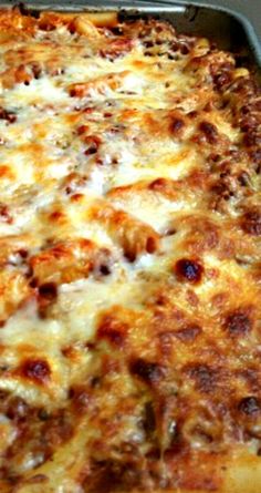 a cheesy casserole is shown in a pan with the words classic baked ziti