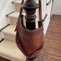 Brown Woven Leather Tote Travel Woven Leather Pouch Shoulder Bag, Travel Pouch Shoulder Bag In Woven Leather, Everyday Woven Leather Pouch Shoulder Bag, Brown Textured Leather Shoulder Bag For Errands, Woven Leather Pouch Shoulder Bag For Shopping, Brown Woven Leather Shoulder Bag, Woven Leather Bucket Hobo Bag, Woven Leather Crossbody Bucket Bag For Everyday Use, Leather Hobo Bag With Woven Leather Pouch