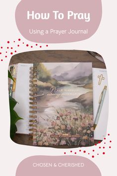 beautiful prayer journal with mountains and flowers